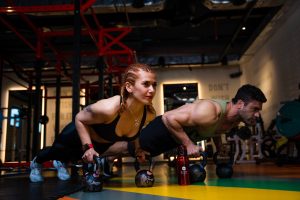 man and woman working out